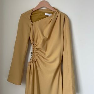 Jonathan Simkhai yellow cutout midi dress.